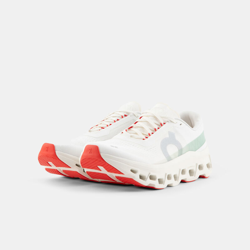 On Cloudmonster 1, bianco/arancione/verde