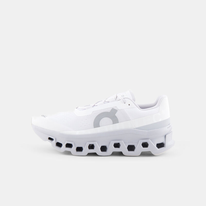 On Cloudmonster, bianco/grigio