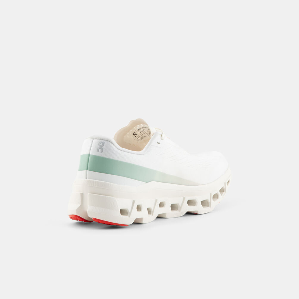 On Cloudmonster 1, bianco/arancione/verde
